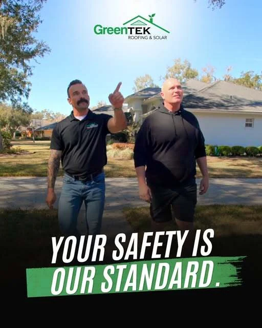Greentek social graphic — two men in a front garden looking up at a roof, one pointing, over the headline “Your safety is our standard”